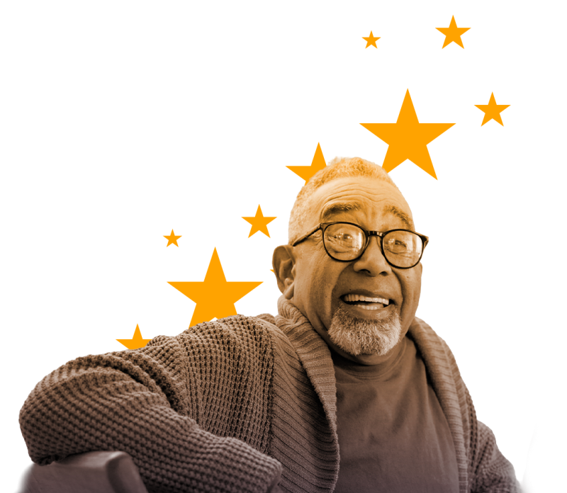 elderly male sitting and smiling